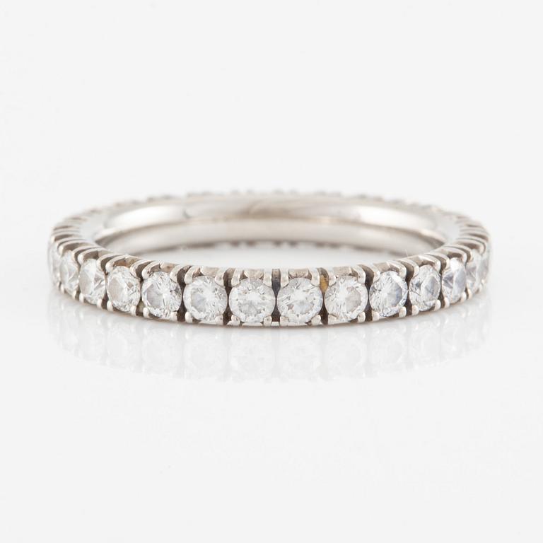 Cartier eternity ring in platinum with round brilliant-cut diamonds.