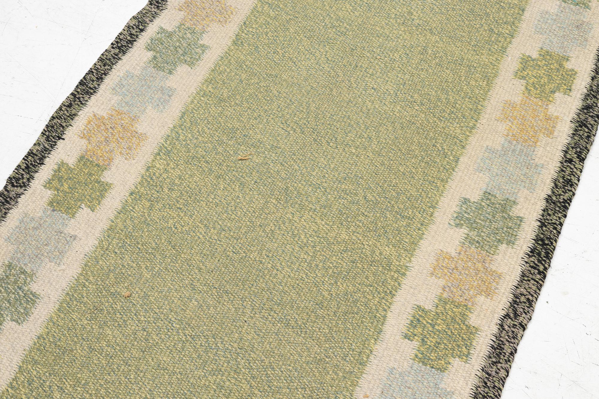 A flat weave 'Kastellholm' runner by Ingegerd Silow, c 247 x 90 cm, unsigned.