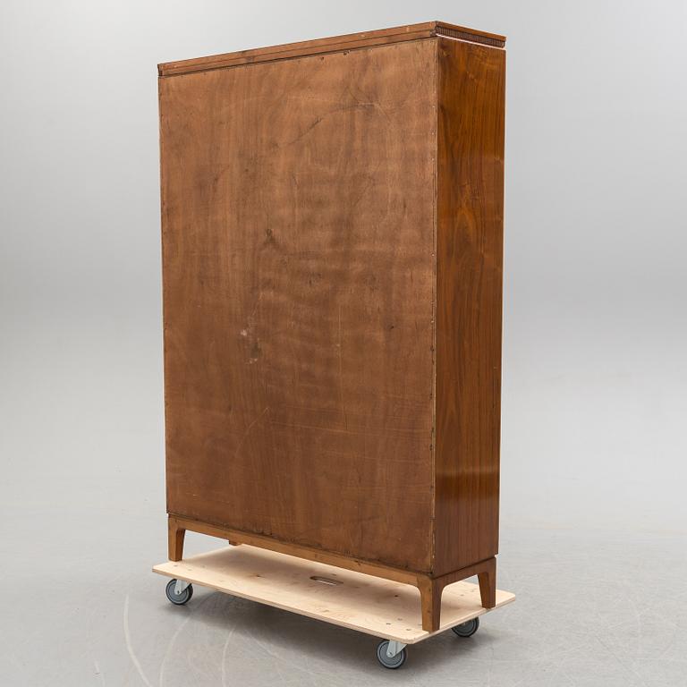 BOKHYLLA, 1900-talets mitt.