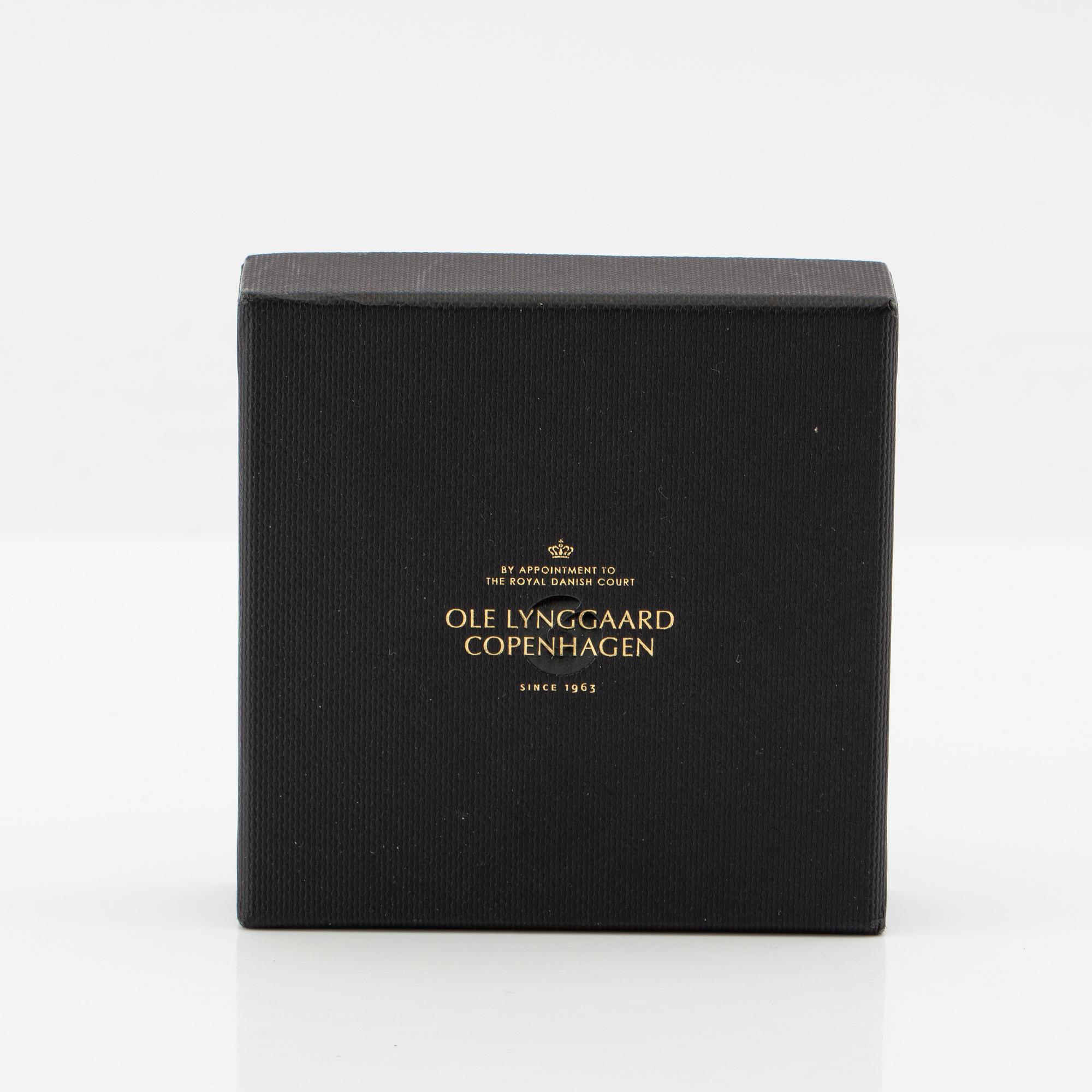 Ole Lynggaard, "Mini drop" silver and waxed textile, design by Charlotte Lynggaard.