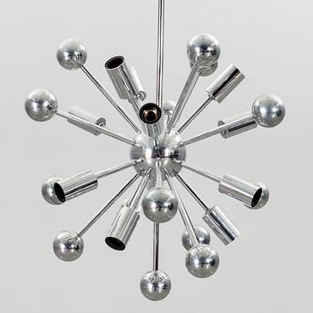 A Paul de Haan Sputnik pendant.