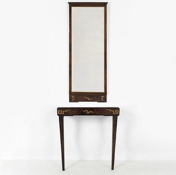 A Swedish Grace mirror and a console table, 1920's/30's.
