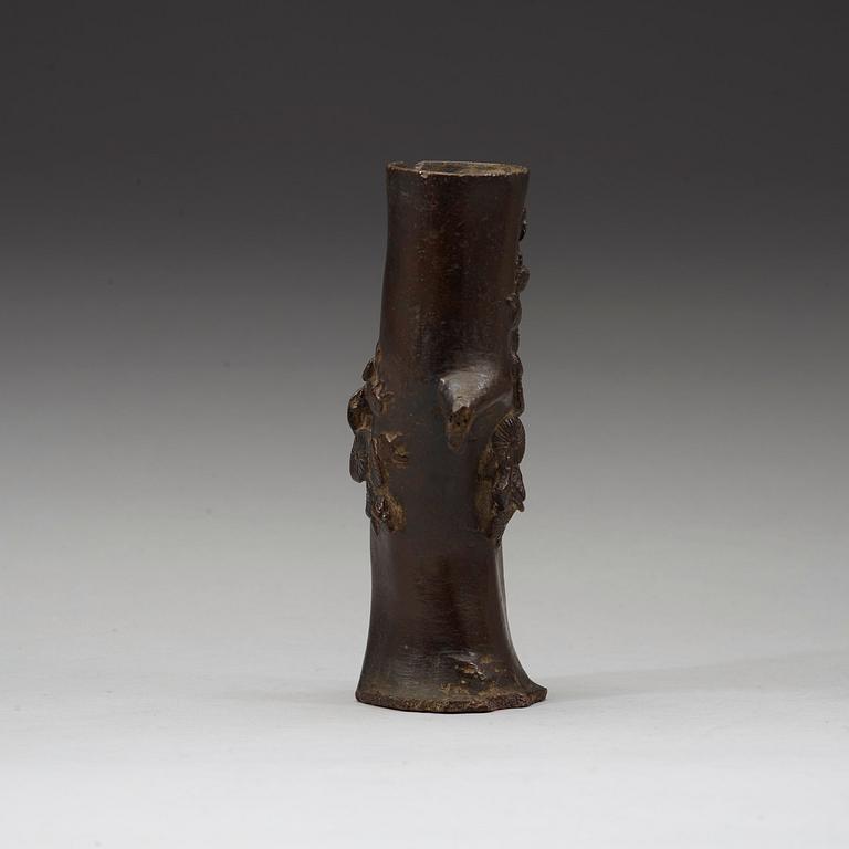 A bronze wood shaped vase, Ming dynasty (1368-1643).