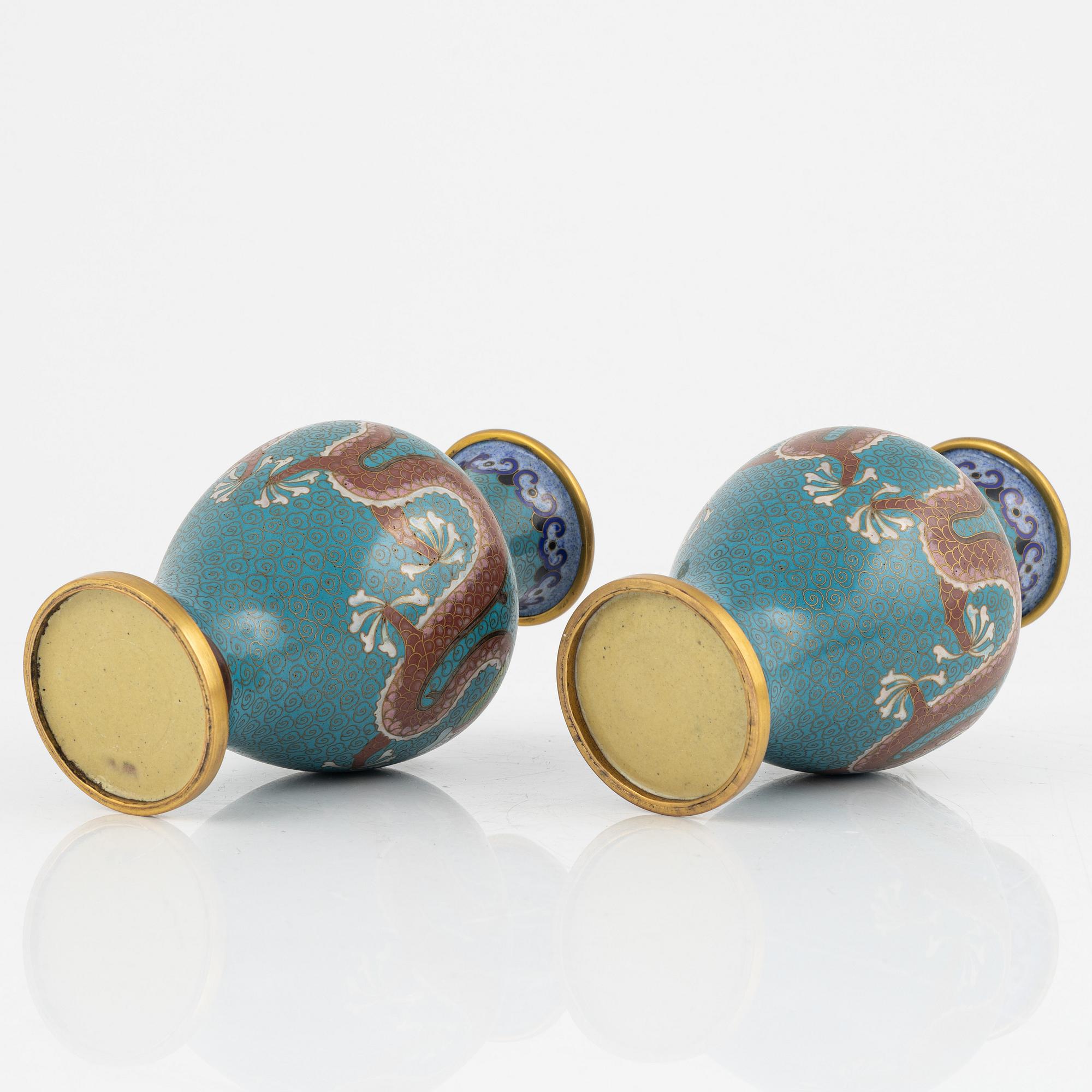 A silk clad box with two cloisonné vases, China early 20th Century.