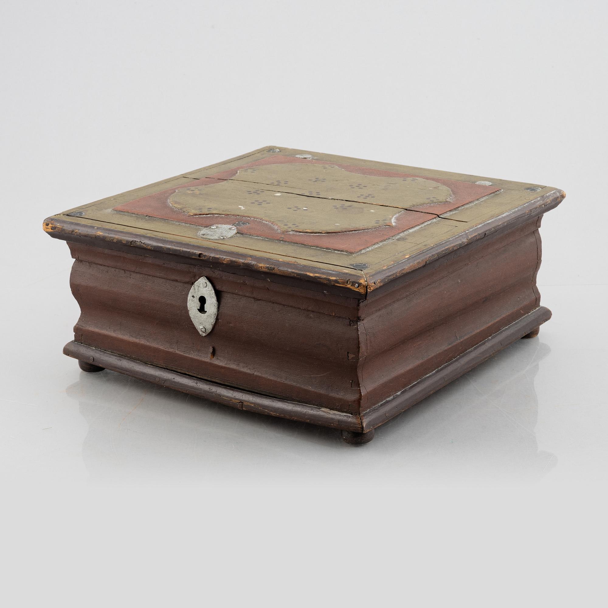 A wooden box, Sweden, dated 1776.