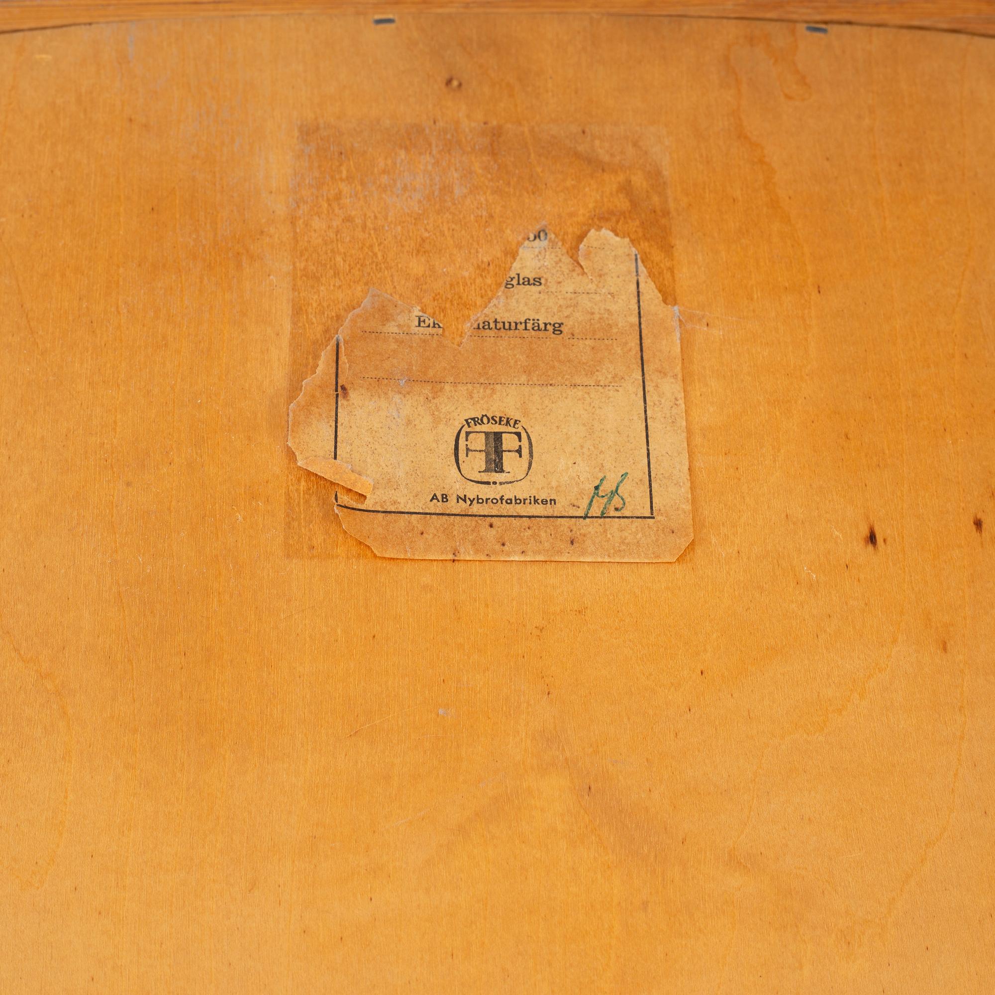 An oak mirror  Fröseke, AB Nybrofabriken, mid 20th Century.