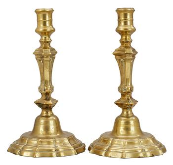 852. A pair of French 18th cent brass candlesticks.