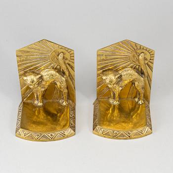 A pair of art déco bronze book ends, 1930s.
