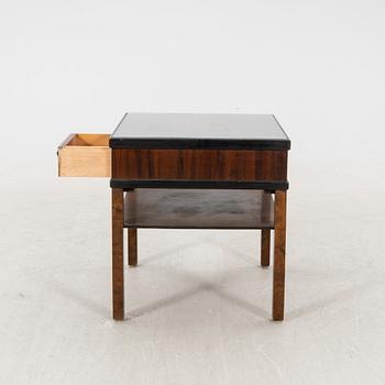 A 1940s birch side table.