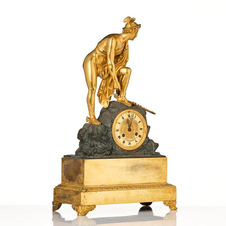 A French Empire ormolu and patinated bronze mantel clock, Paris, early 19th century.