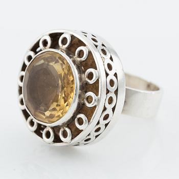 Silver ring with gold stone, signed Ulla Holm.