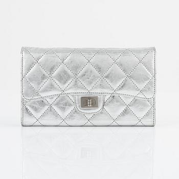 Chanel, a quilted silver leather wallet, 2006-08.