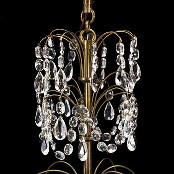 A mid-20th century, baroque style chandelier.