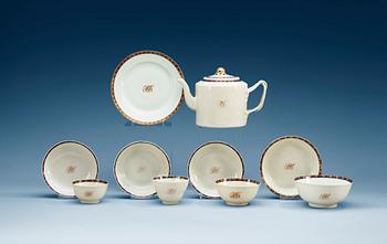 1677. An armorial tea service, Qing dynasty, Jiaqing (1796-1820). (11 pieces).