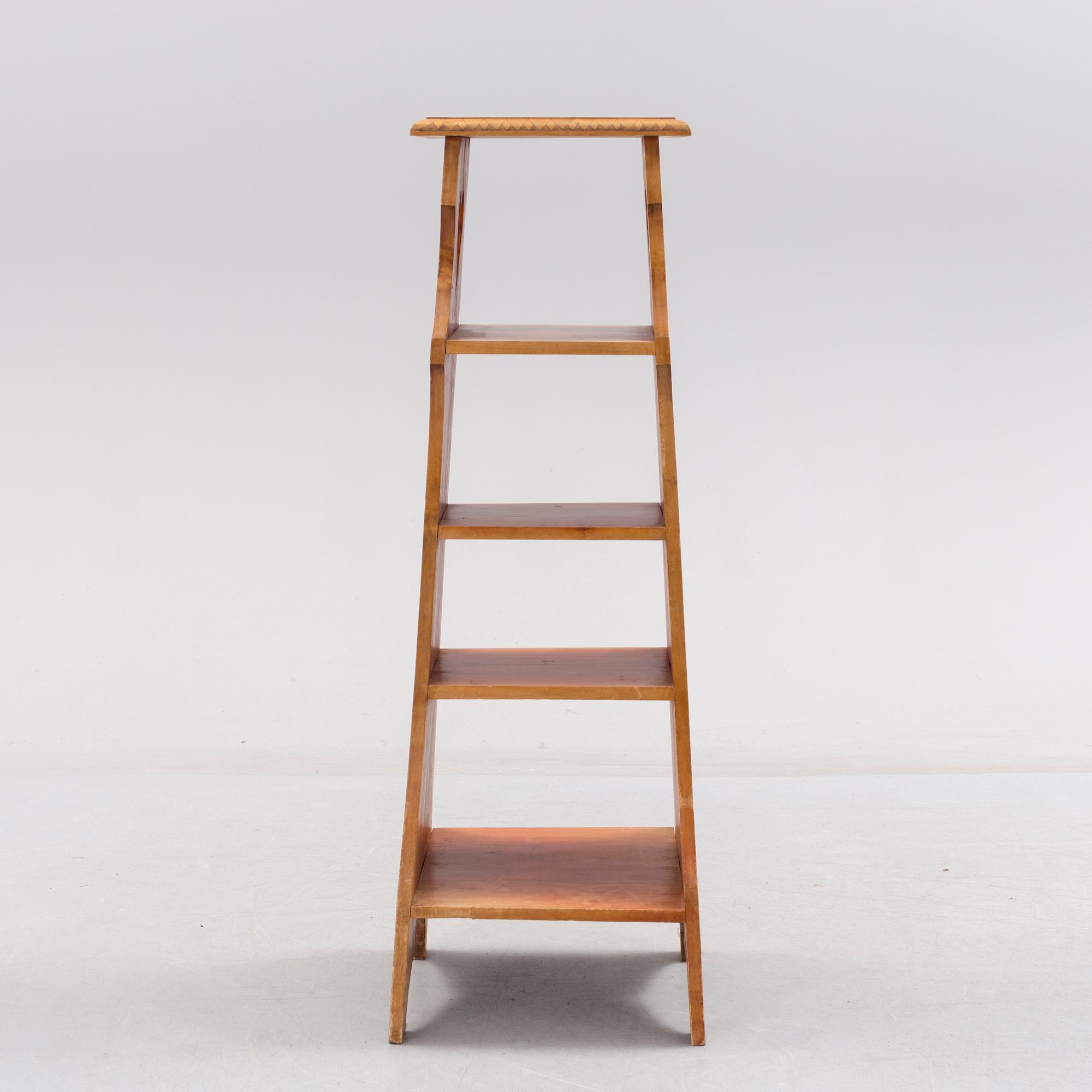 An early 20th century art nouveau shelf.