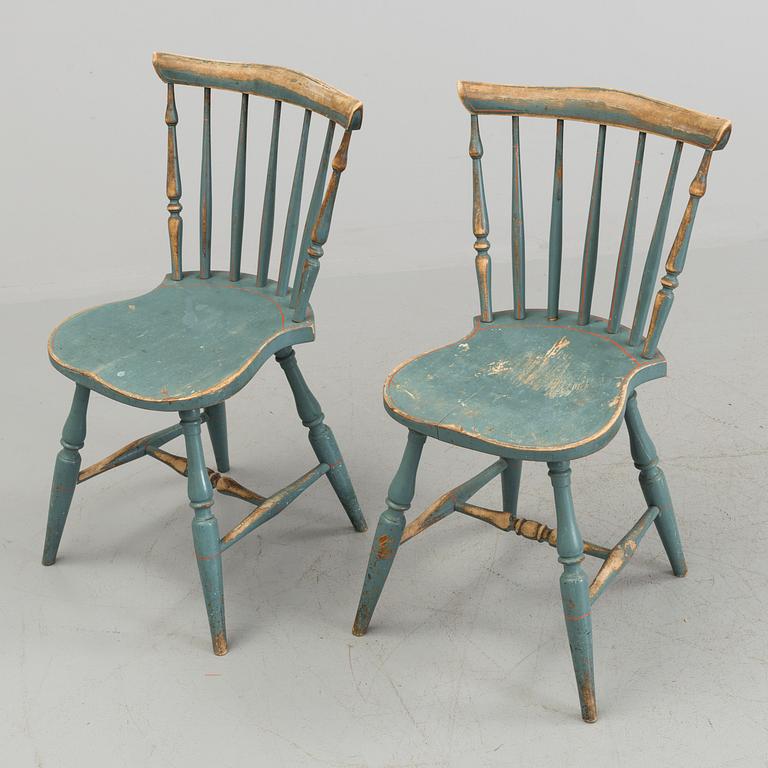 A pair of late 19th century painted chairs.