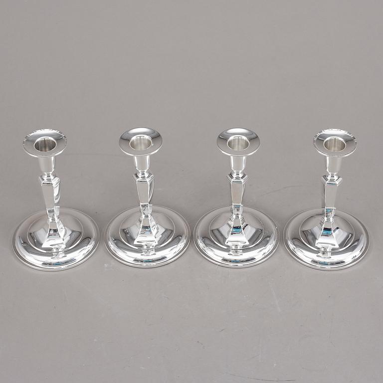 LJUSSTAKAR, 4st snarlika, silver, K&EC, Göteborg, 1956.