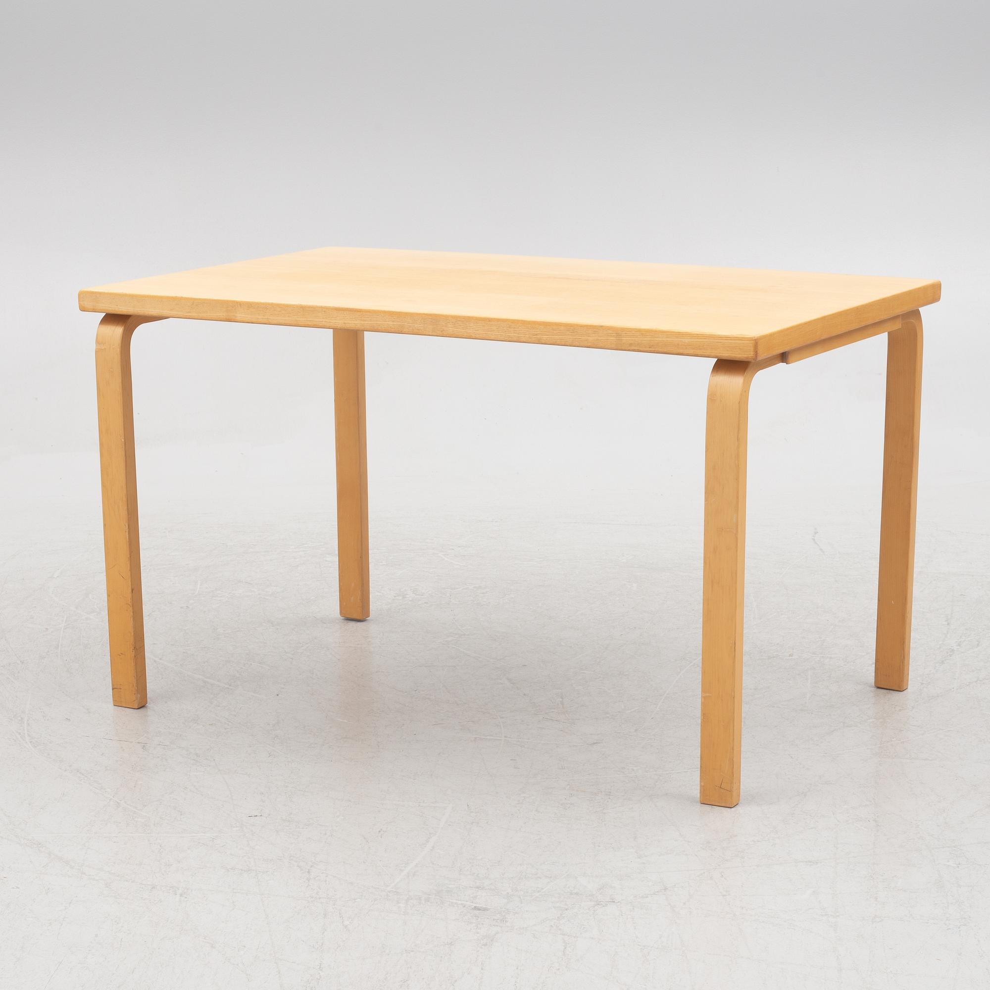 Alvar Aalto, a model 81B birch dining table, Artek, Finland.