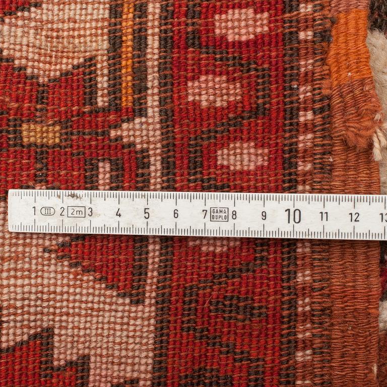 A CARPET, a semi-antique Melas/Milas, Anatolia, ca 257 x 174 cm (as well as 3 and 1 cm flat weave at the ends).