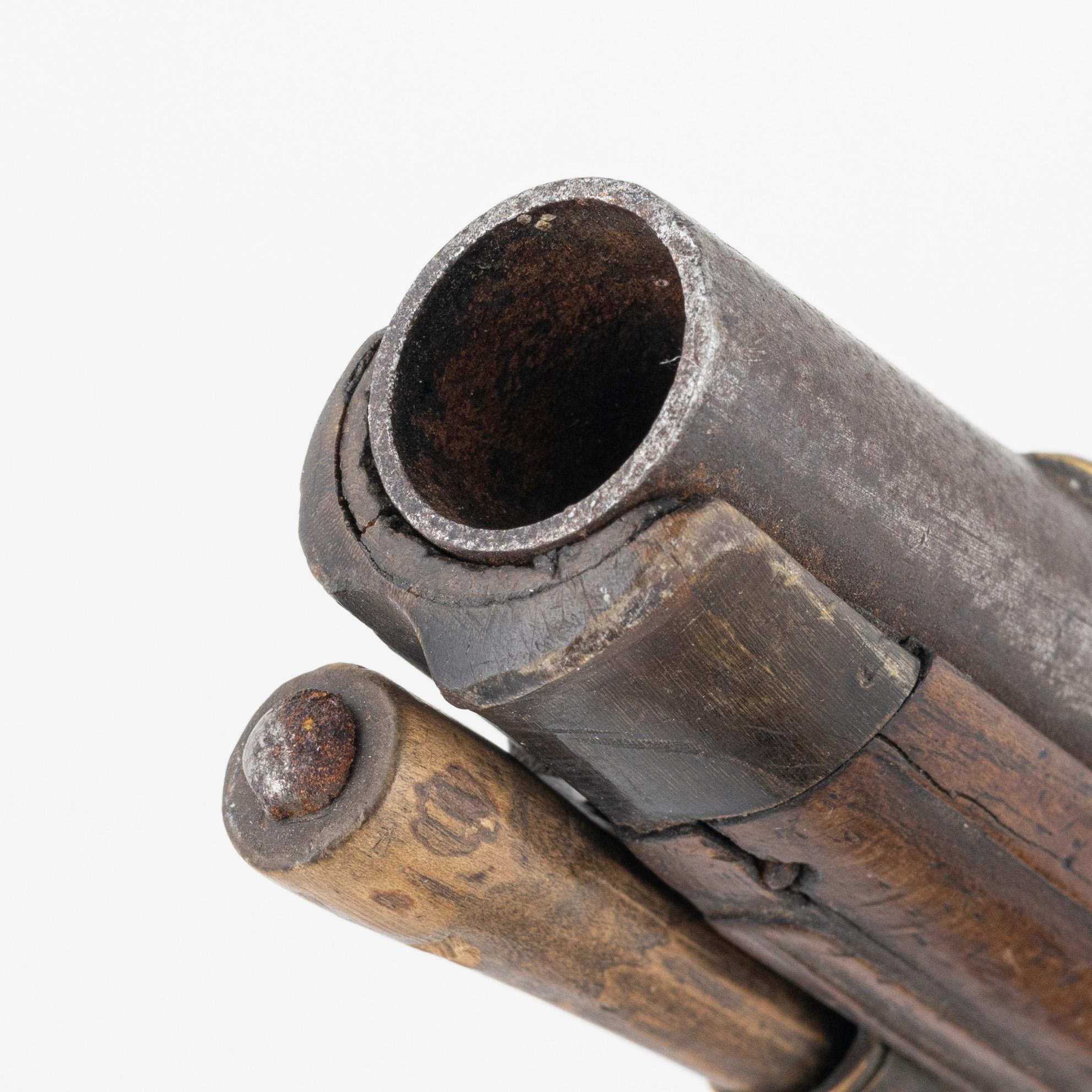 A percussion pistol, 19th century.