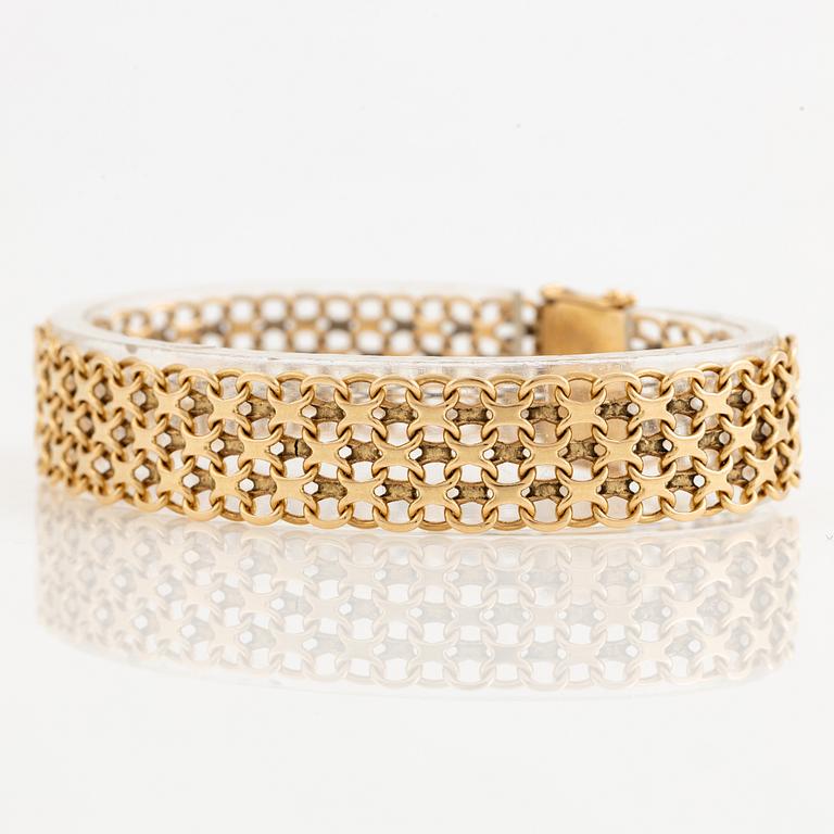 Arm bracelet, 18K gold, x-link.