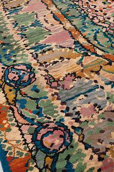 A CARPET, knotted pile, ca 488-491 x 347,5-350,5 cm, probably France, first third of the 20th century.