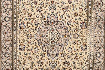 A carpet, Kashan, circa 302 x 197 cm.