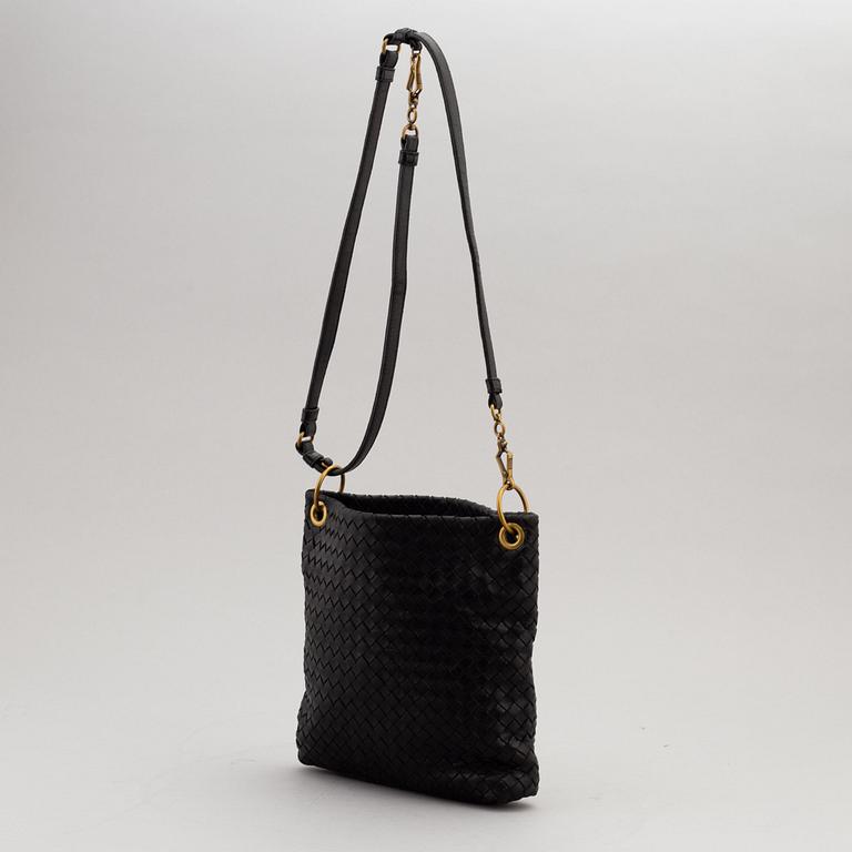 Bottega Veneta, a black intrecciato handbag.