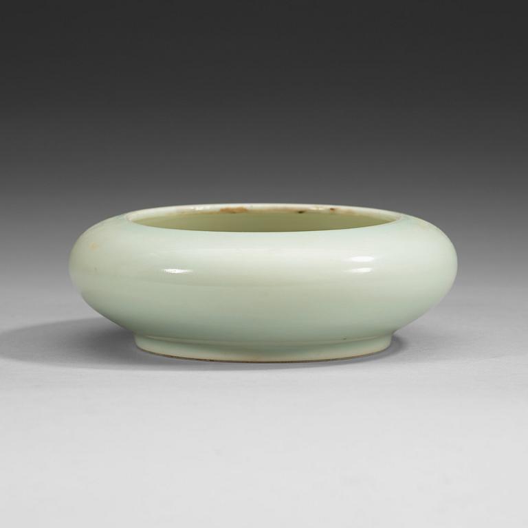 A pale celadon glazed brush washer, Qing dynasty (1644-1912), with Kangxi six character mark.