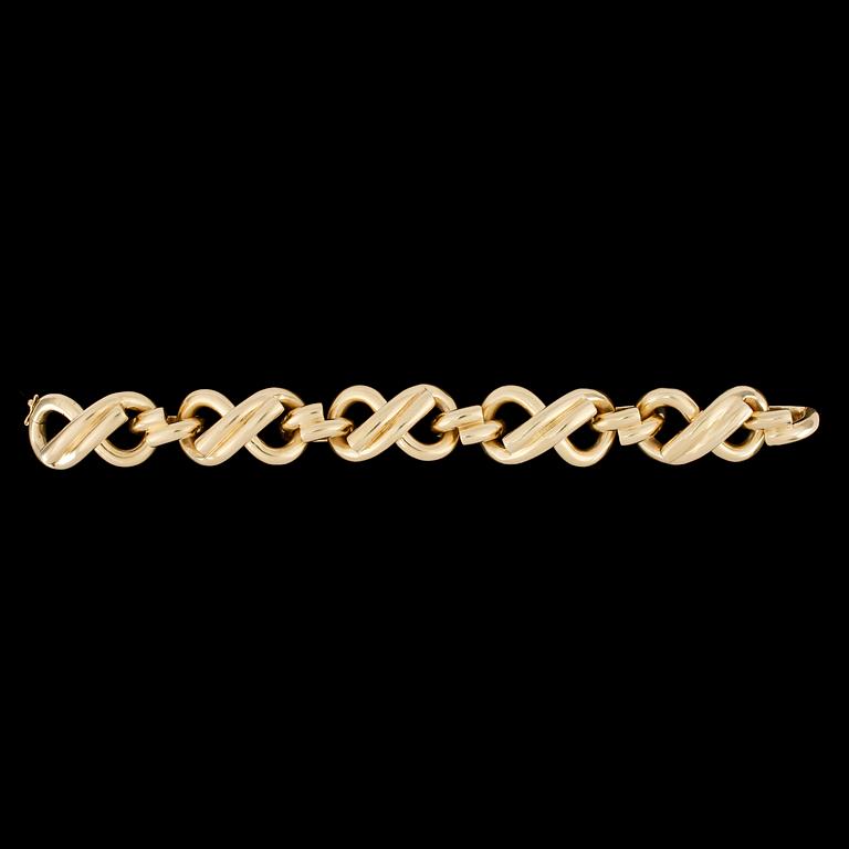 A gold bracelet.