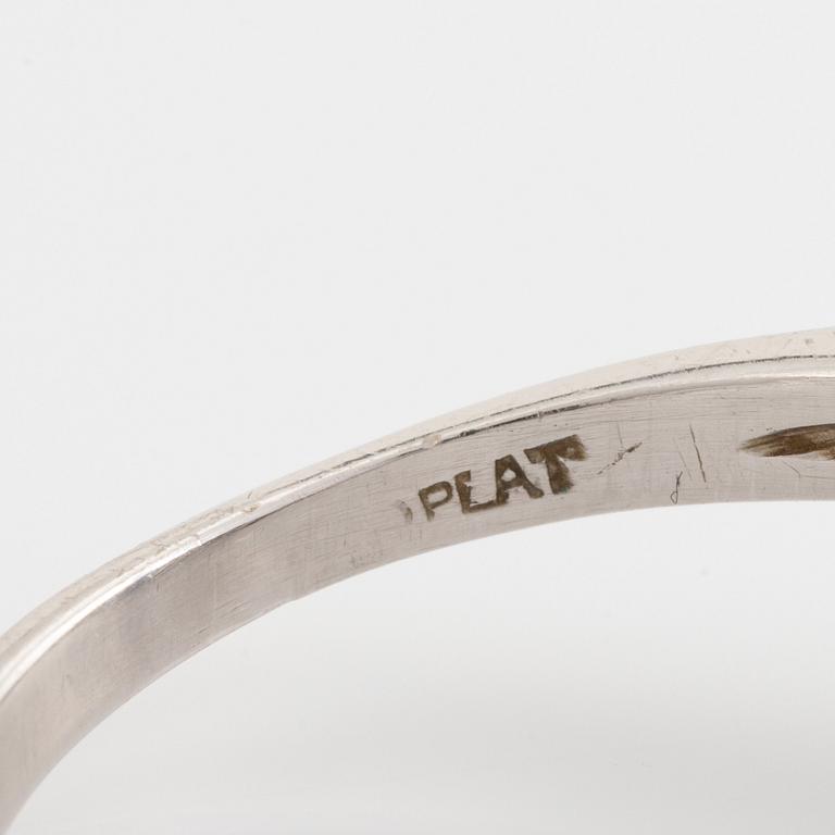 Platinum, brilliant and baguette cut diamond ring.