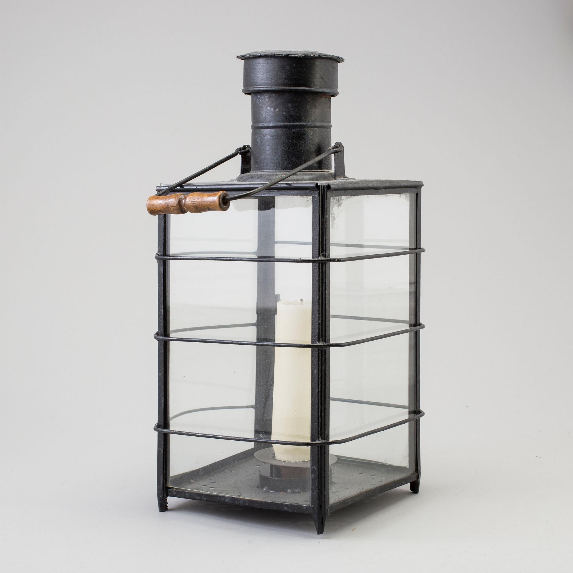 A TINPLATE LANTERN, first half of the 20th century.