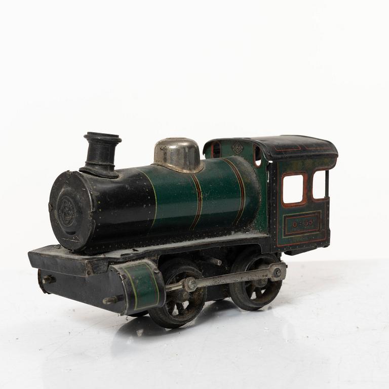 Model train with track and station building, 13 pieces, Germany, 1920s.