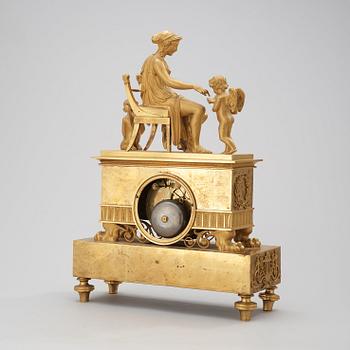 A French Empire early 19th century mantel clock, marked Thiery à Paris.