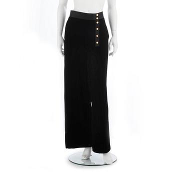 CHANEL, a pair of black velvet pants.