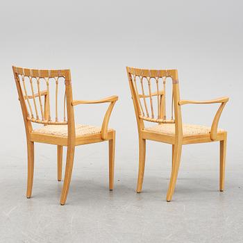 A pair of mahogany armchairs, model 1165, designed by Josef Frank in 1946 for Firma Svenskt Tenn.