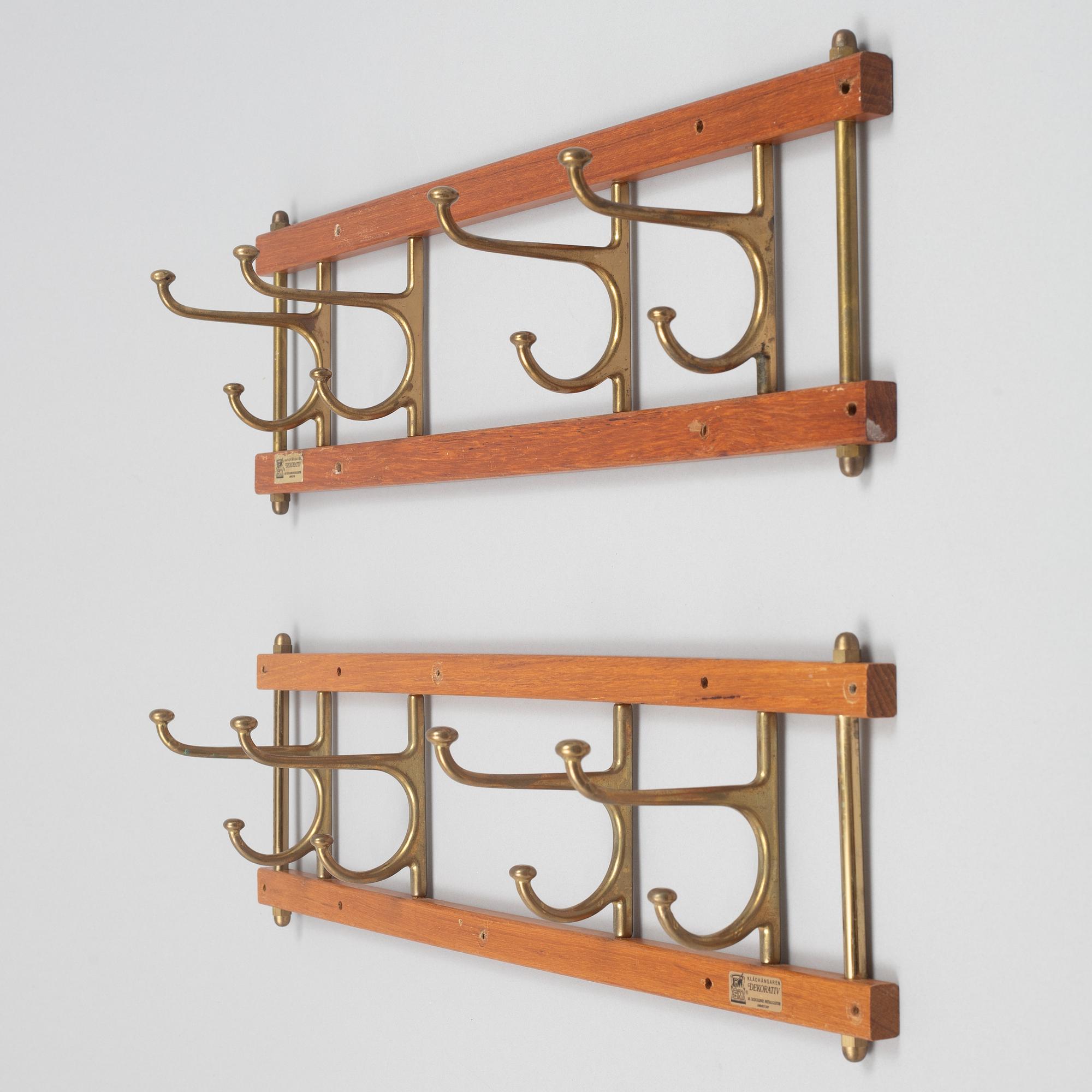 A pair of 'Dekorativ' coat hangers, Skoglunds metallgjuteri, Anderstorp, 1950's/60's.