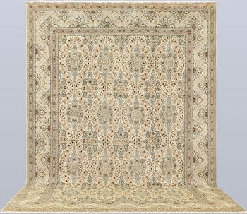 A carpet, Keshan, approx. 410 x 295 cm.