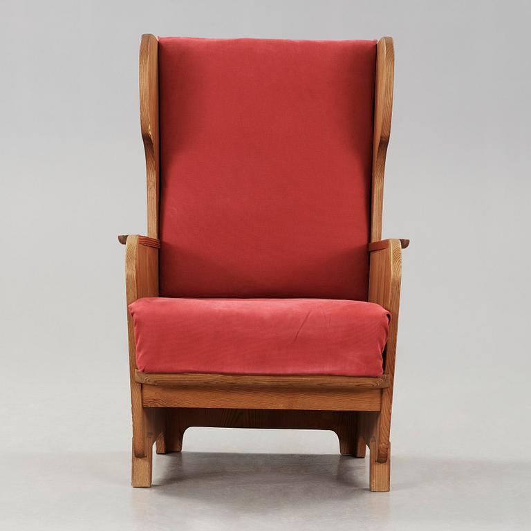 Axel Einar Hjorth, a 'Lovö' stained pine armchair, Nordiska Kompaniet, Sweden 1930's.