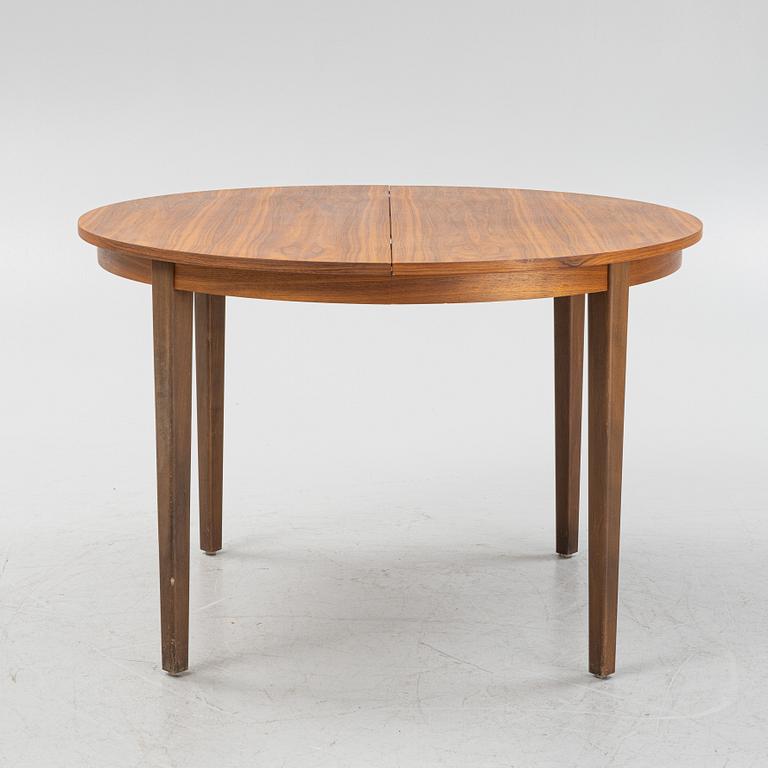 A walnut veneer dining table, 1950-60s.