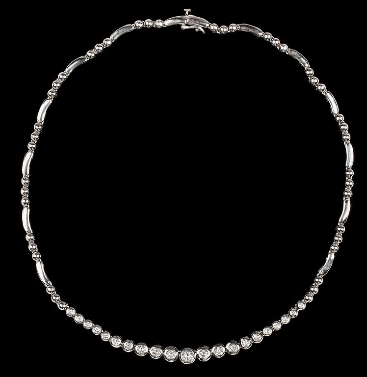 A brilliant cut diamond necklace, tot. app. 3 cts.