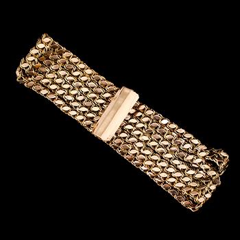ARMBAND, 18 och 14 k guld. Vikt ca 32 g.