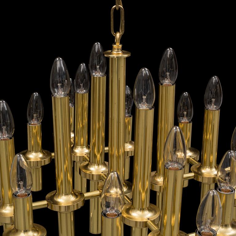 an italian brass ceiling light, possibly Gaetano Sciolaro, from the 1970's.