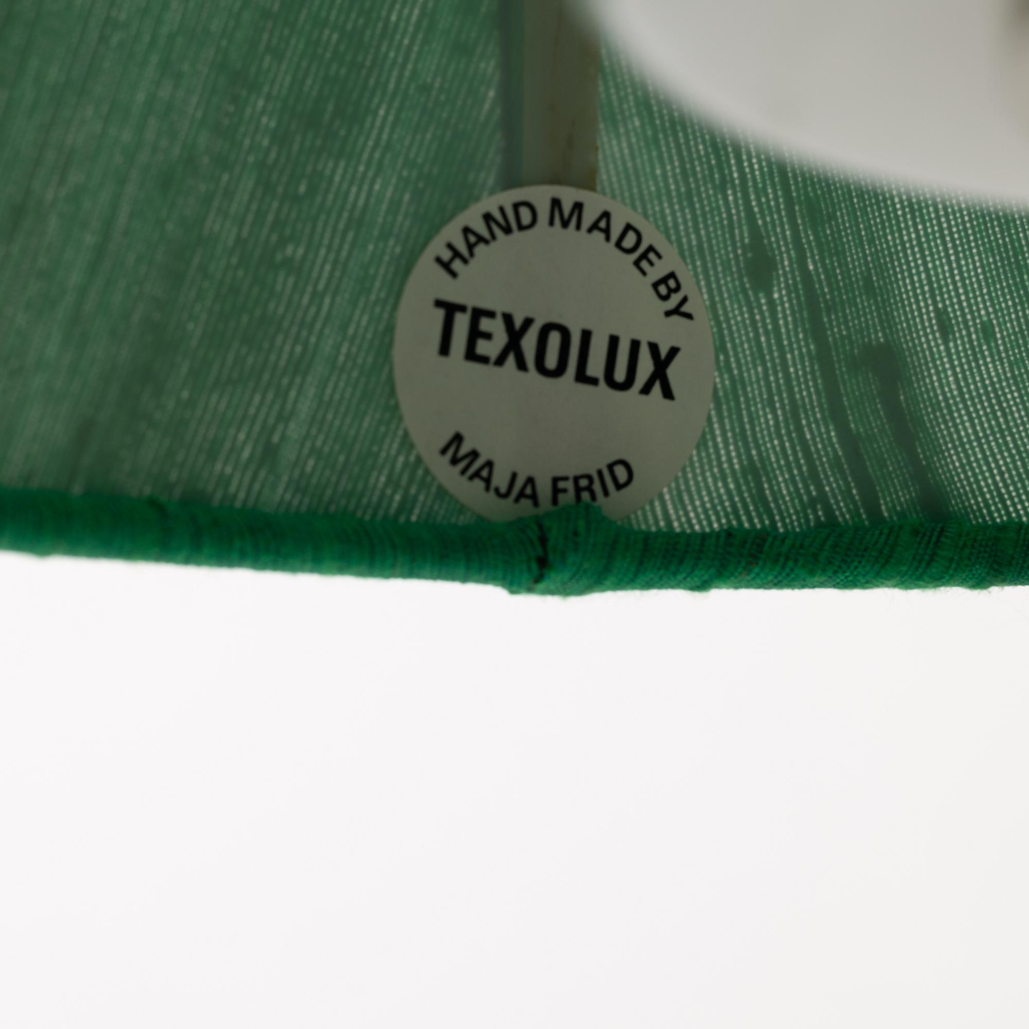 Uno & Östen Kristiansson, a pair of wall lamps, Luxus, Vittsjö.