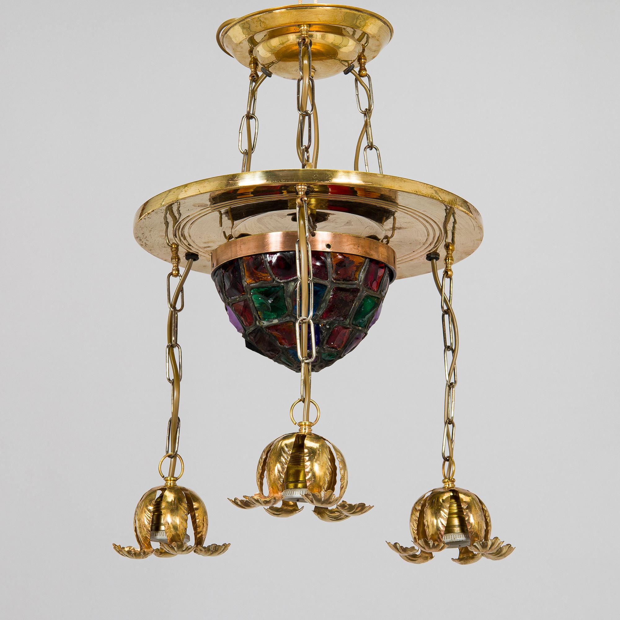 Kattovalaisin, 1900-luvun alku.