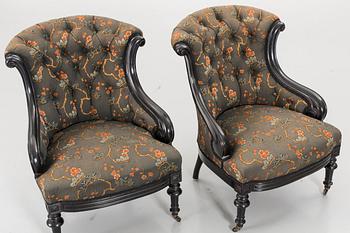 A pair of late 19th century lounge chairs.