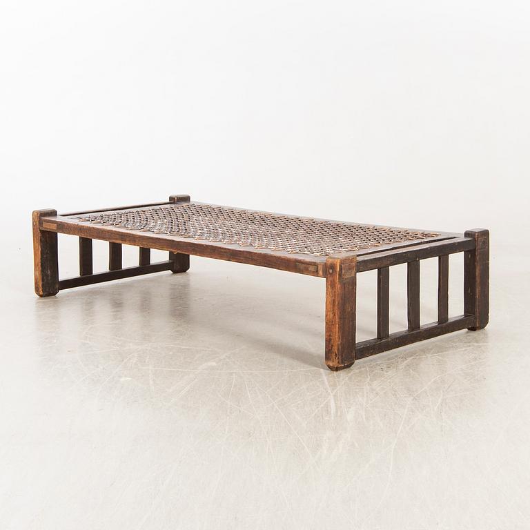 A day bed/coffee table 20th century Southeast Asia.