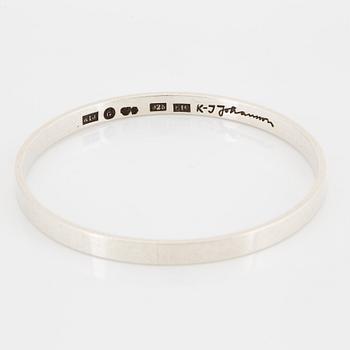 KARL-INGEMAR JOHANSSON, silver bangle.