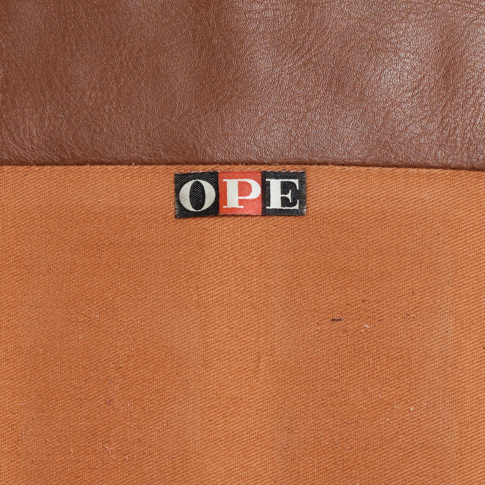 Ib Kofod-Larsen, a teak and brown leather easy chair, Olof Perssons Fåtöljindustri (OPE), Sweden, 1950-60's.