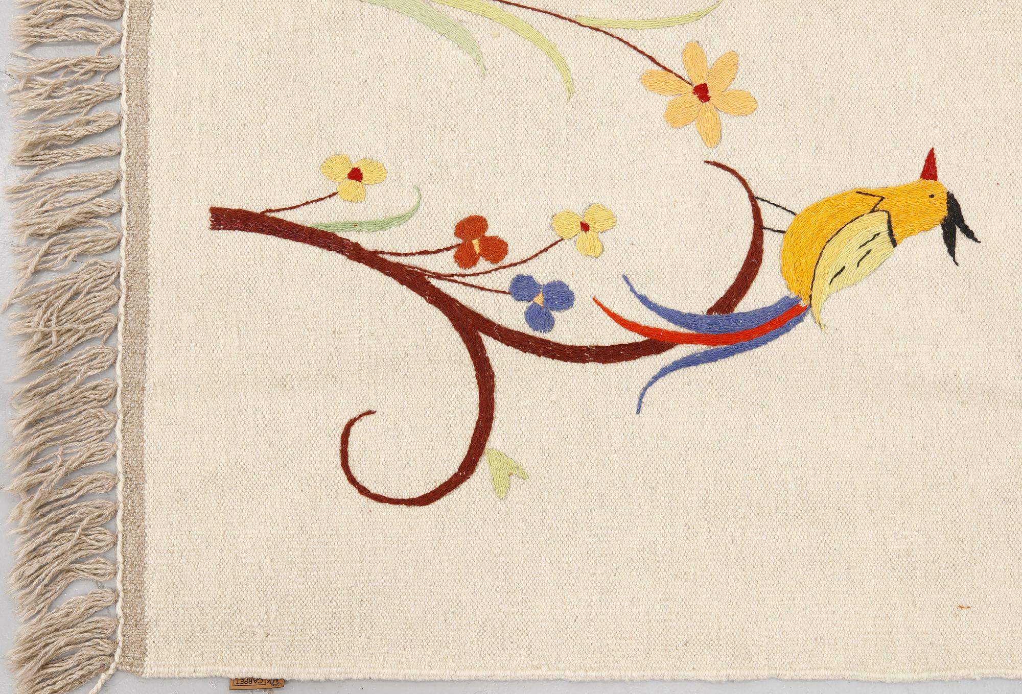 An embroided oriental flat weave carpet, circa 225 x 175 cm.
